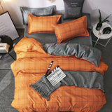 Housse de couette et deux taies d'oreiller à carreaux orange (240 cm)