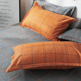 Housse de couette et deux taies d'oreiller à carreaux orange (240 cm)