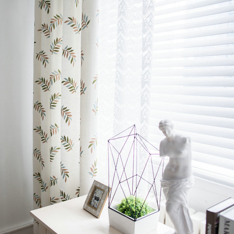 Rideau à oeillets tamisant feuille brodé (135 x H240 cm)