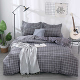 Housse de Couette et Deux Taies Grille 240cm Gris